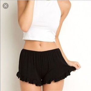 brandy melville vodi ruffle shorts in black